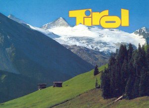 VINTAGE CONTINENTAL SIZE POSTCARD LATERAL VIEW OF MOUNTAIN FIELDS TIROLS AUSTRIA