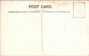 Connecticut Mystic , Man digging clams, Woolen Mill backgound