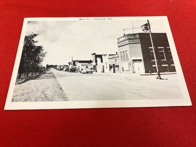 1953 Postcard PRENTICE WI Main St RPPC Fairbanks Card Co,  to Fred Titus