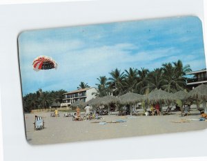 Postcard The Parachute Ride ends on the Beach in Puerto Vallarta Mexico