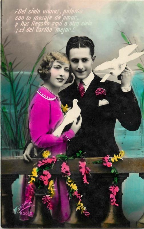 c1930 Brightly Tinted Real Photo Postcard Spanish Loving Couple with Doves Used