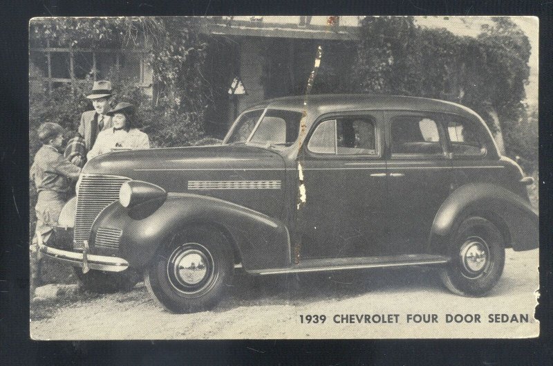 1939 CHEVROLET FOUR DOOR SEDAN VINTAGE CAR DEALER ADVERTISING POSTCARD