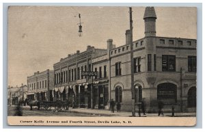 1913 Devils Lake ND Postcard Kelly & Fourth Street Scene Drug Store People