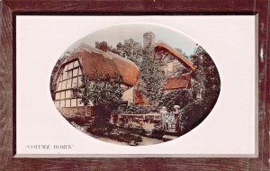 ENGLAND~COUNTRY COTTAGES~REAL PHOTOGRAPH ON BROMIDE PAPER-OVAL IMAGE POSTCARD