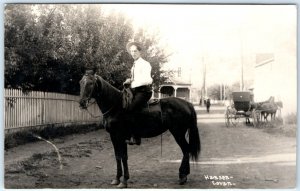 c1900s Man on Horse RPPC Carriage Hanson & Lovan Real Photo PC Oregon? A135