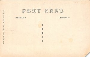 J17/ Windom Minnesota RPPC Postcard c1910 10th Street West Stores  105