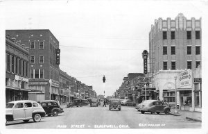 J69/ Blackwell Oklahoma RPPC Postcard c1940s Main Street Stores  154