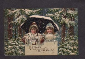 A Merry Christmas Greetings Girls Umbrella Snowing Winter Embossed Postcard