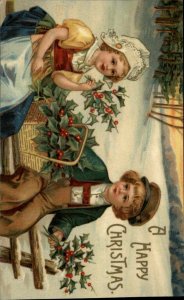 Christmas Little Dutch Boy and Girl c1910 Gel Vintage Postcard