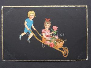 Greeting LITTLE BOY PUSHES LITTLE GIRL IN WHEEL BARROW c1929 by HWB Series 12870