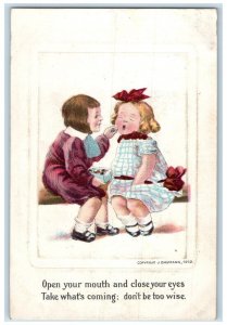 c1910's Valentine Children Eating Chocolates Embossed Baumann Antique Postcard