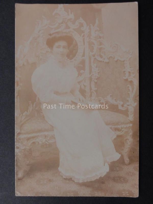 Studio Portrait of Smiling Young Lady with book on Grand Chair - Old RP Postcard