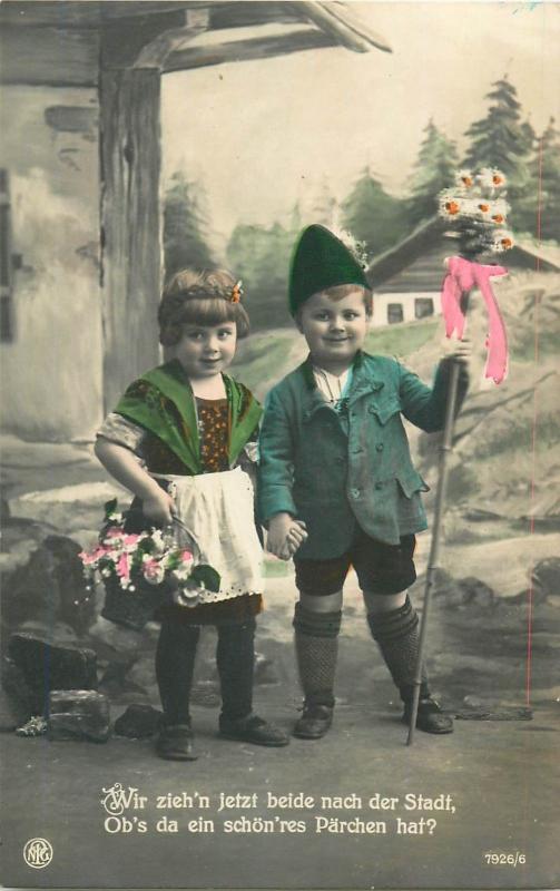 Vintage tinted real photo postcard c 1920s cute children couple folk costumes