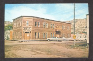 MEDORA NORTH DAKOTA THE ROUGH RIDERS HOTEL OLD CARS POSTCARD 1963 CHEVY IMPALA