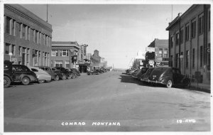 J33/ Conrad Montana RPPC Postcard c1950s Automobiles Stores Hotel  210