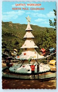 SANTA'S WORKSHOP, North Pole CO ~ Amusement Park CHRISTMAS TREE RIDE Postcard