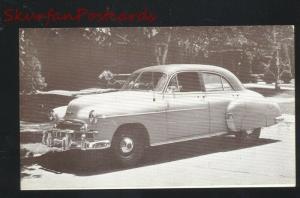 1949 CHEVROLET STYLELINE 4 DOOR SEDAN CAR DEALER ADVERTISING POSTCARD
