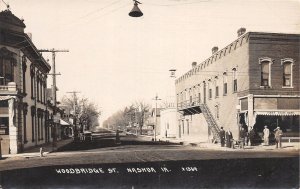 J65/ Nashua Iowa RPPC Postcard c1910 Woodbridge St Stores Bank 121