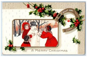 1910 Christmas Children Snowman Horseshoe Holly Berries Embossed Postcard 