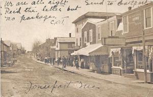 Jonesport ME Dirt Street Storefronts in 1906 RPPC Postcard