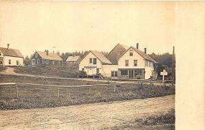 Wellington ME Dirt Street View Store Fronts Rail Fence RPPC Postcard