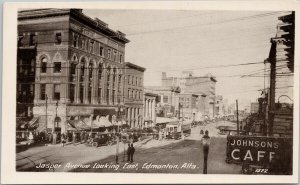 Edmonton Alberta Jasper Ave looking east Empire Block Johnson Cafe Postcard H7