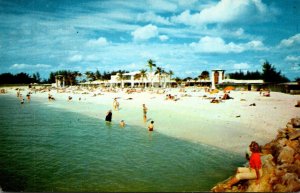 Florida Sarasota Lido Beach Sunbathers and Beach Club In Bachground 1967