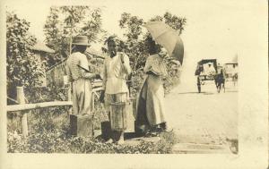 philippines, Native Woman with Water Carriers (1920s) RPPC Postcard
