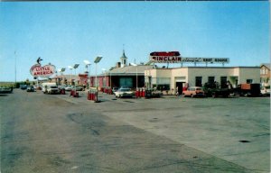 WY, Wyoming  HOLDING'S LITTLE AMERICA Sinclair Gas~50's Cars  ROADSIDE  Postcard