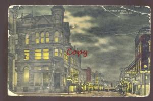 SEDALIA MISSOURI DOWNTOWN OHIO STREET SCENE AT NIGHT VINTAGE POSTCARD RPO