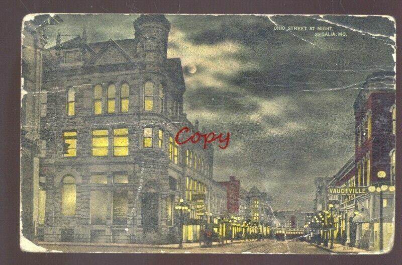 SEDALIA MISSOURI DOWNTOWN OHIO STREET SCENE AT NIGHT VINTAGE POSTCARD RPO