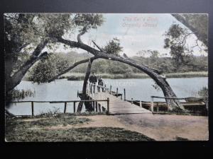Norfolk Broads: THE EEL'S FOOT, ORMESBY BROAD showing Two Men on Jetty c1905
