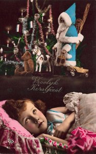 Young Girl Dreaming Blue Suited Santa Claus Toys Merry Christmas Postcard