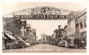 RPPC RENO, NEVADA Virginia Street Signs Arch Herz Jewelry 1940s Vintage Photo