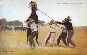 Cowboys Saddling Bronco Western 1910c postcard