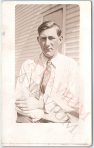 c1910s Outdoor Man Squint RPPC Sunny Day House Real Photo Stiff Upper Lip A160