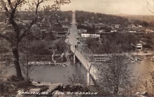 Branson Missouri Panorama~View Over Bridge~Road Uphill~Homes~Boats~1930s RPPC