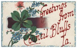 COUNCIL BLUFFS IOWA GREETINGS FROM POSTCARD c1910s FOUR LEAF CLOVERS