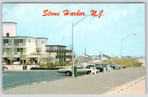 1960-70's STONE HARBOR NEW JERSEY HARBOR CLASSIC CARS PARKED AT BEACH POSTCARD