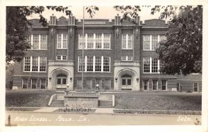 Pella Iowa~High School Building~Tulips along Cobblestone Street~1940s RPPC