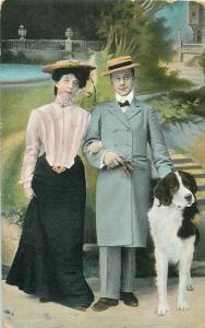 Postcard 1906 romantic couple & dog