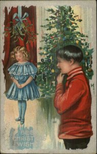 Christmas - Boy & Girl Tree Silver Border c1910 Postcard