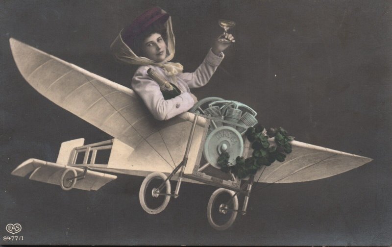 Vintage Postcard 1912 Woman Holding Wine Glass Riding in Airplane Flowers