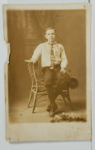 Rppc Young Boy Seated in Wicker Chair c1910  Postcard N18