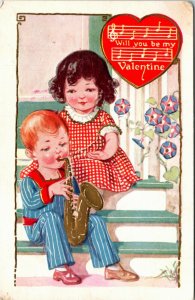 Postcard Valentine's Day Girl Sitting with Boy Playing Saxophone C.1910 K11