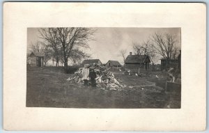 c1910s Outdoor Kids by Chopped Wood Pile RPPC Farm Shed Dog Outhouse Boy A255