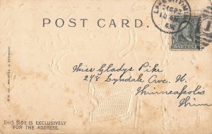 Brown Coat Santa Claus toys backpack Christmas postcard undivided c1907 AD108