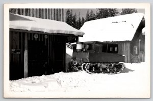 Dixie Idaho RPPC Weasel Carrying Winter Mail Post Office Man Child Postcard K24