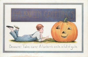 Child Talking to Huge Jack-O Lantern Holidays Halloween greetings 1900s postcard 