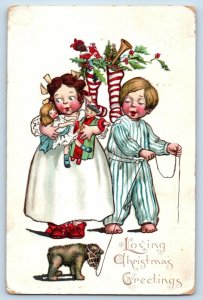 Christmas Postcard Greetings Children With Toys Stockings Kris Kringle Embossed